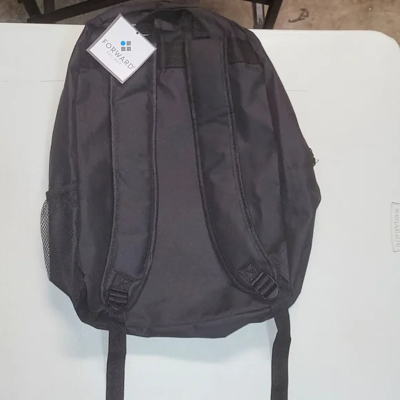 Backpack filled with school supplies - Picture 3 of 4